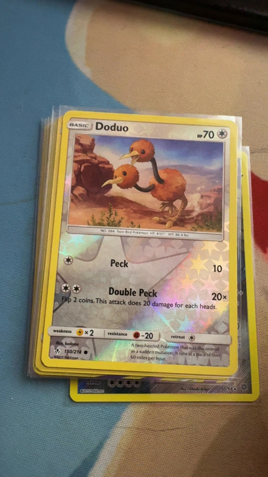 150/214 - Doduo REVERSE HOLO - Unbroken Bonds - Common