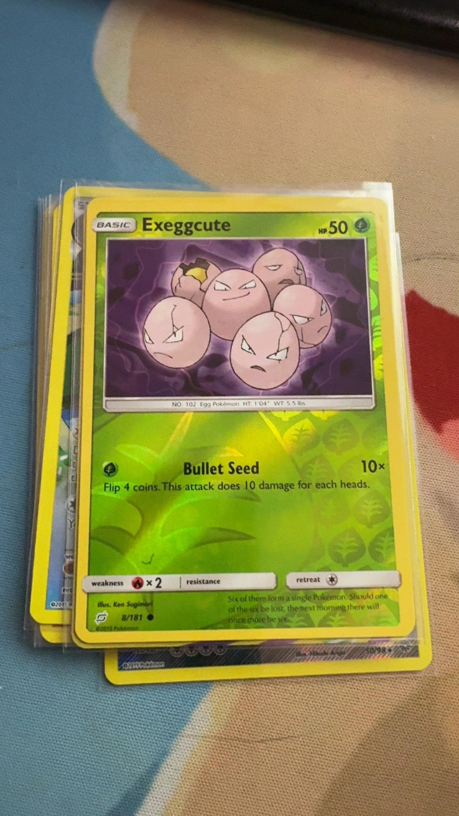 8/181 - Exeggcute REVERSE HOLO - Team Up - Common