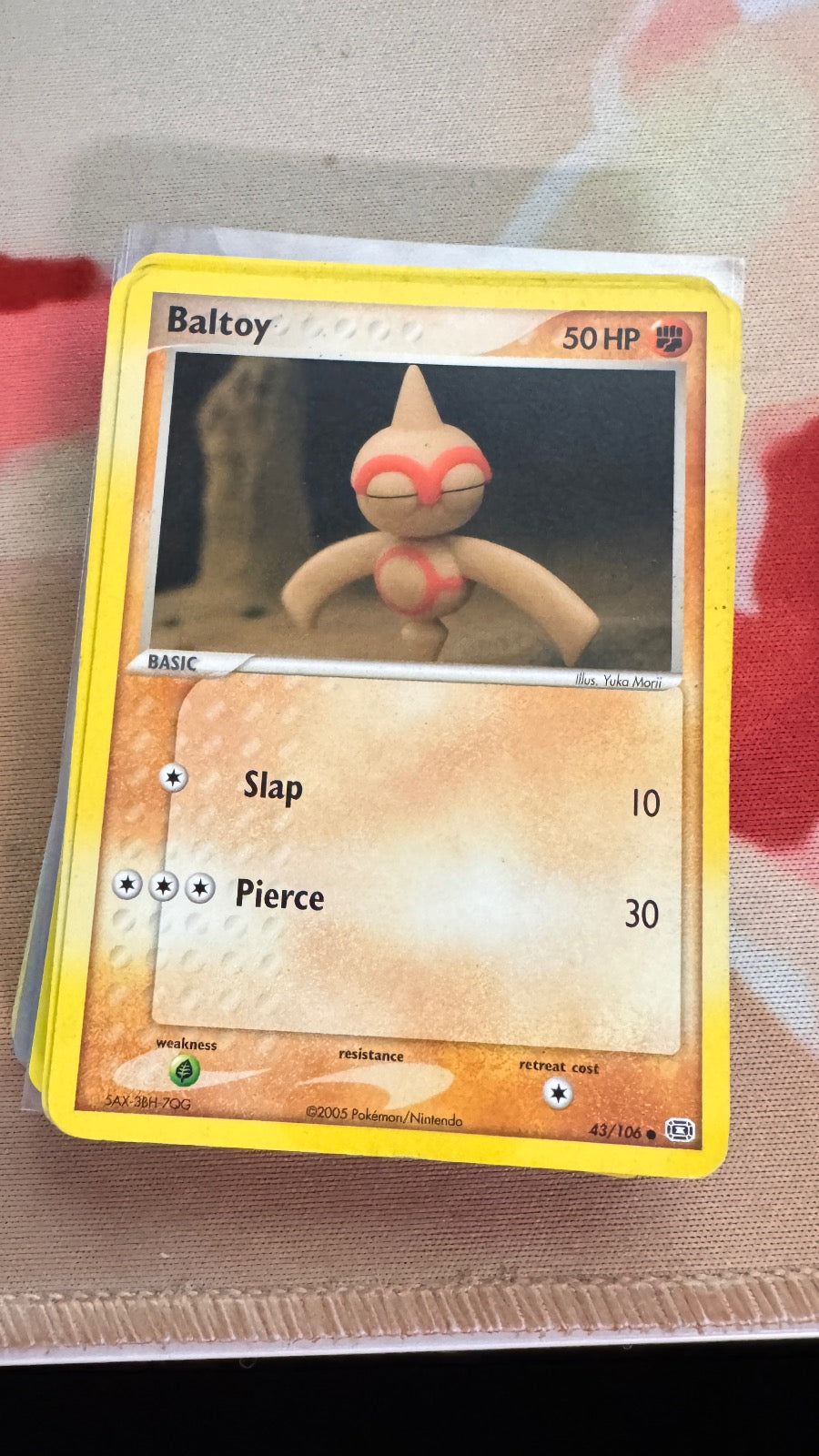 43/106 - Baltoy - Emerald - Common