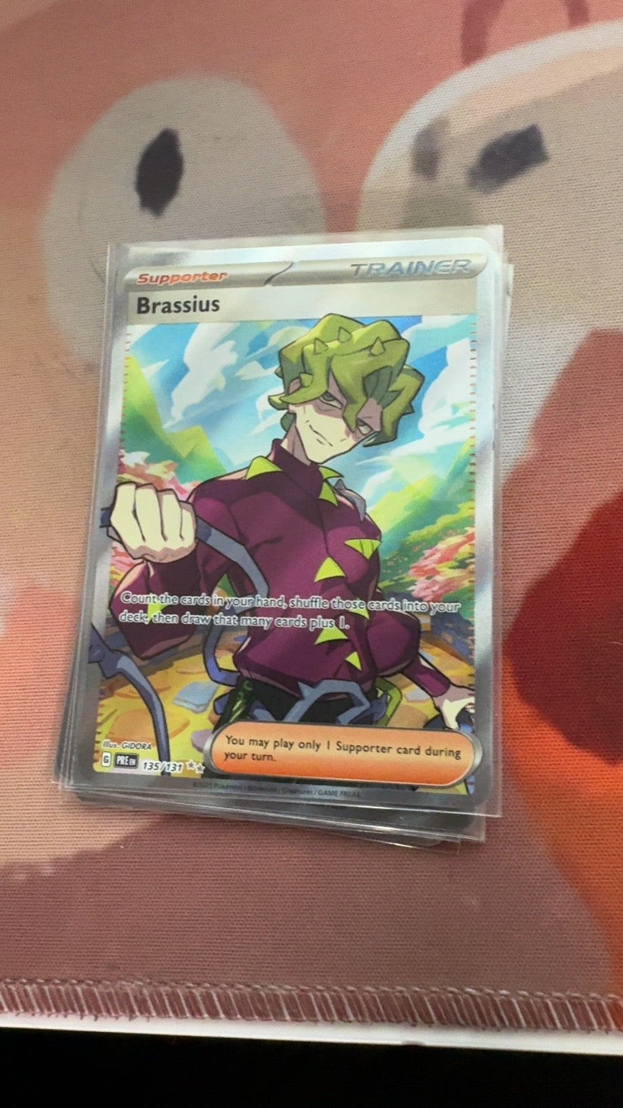 135/131 - Brassius HOLO - Prismatic Evolutions - Ultra Rare